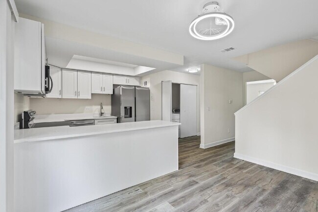 Building Photo - "Charming 2-Bedroom Townhouse Retreat with...