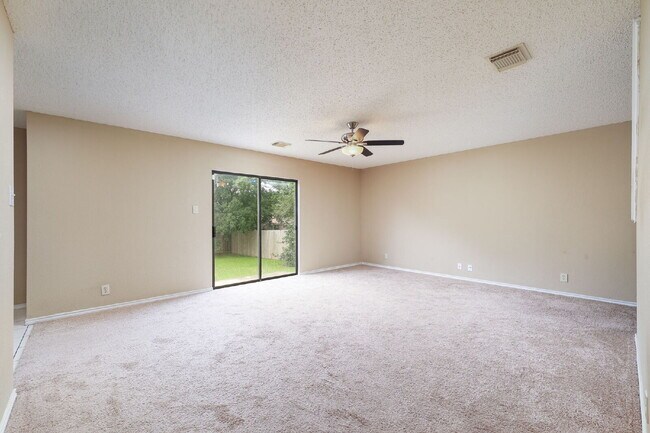 Building Photo - Spacious 3-Bedroom Home with Game Room and...