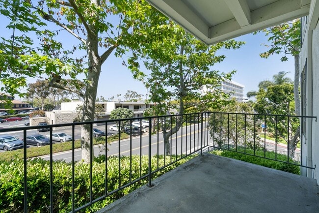 Building Photo - Updated Versailles Condo in Newport Beach