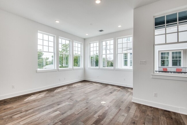 Building Photo - Welcome to a beautiful Craftsman-style Tow...
