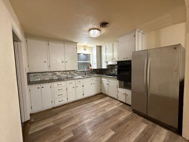 Building Photo - Remodeled four bedroom home!