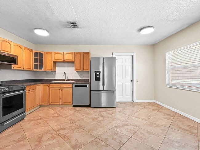 Building Photo - Move-In Ready Pool Home in Gem Village – Coastal Retreat with Modern Updates  - 2bed|1 bath