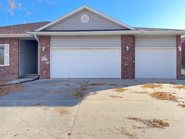Building Photo - Northwest Omaha Gem: 2,700 Sq Ft, 3-Bedroom, Walk-Out Finished Basement, Fenced Yard, 3-Car Garag...