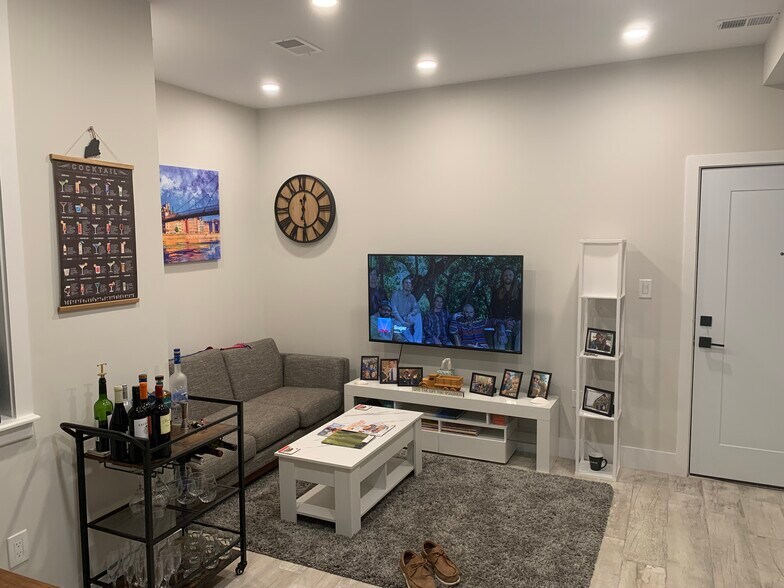 Fully furnished living area. - 2556 University Pl NW