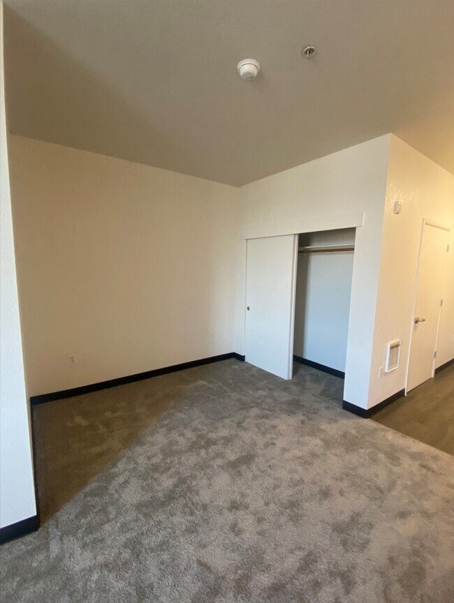 Building Photo - Miley Gardens at Eastmont- 55+ Senior Affordable Community