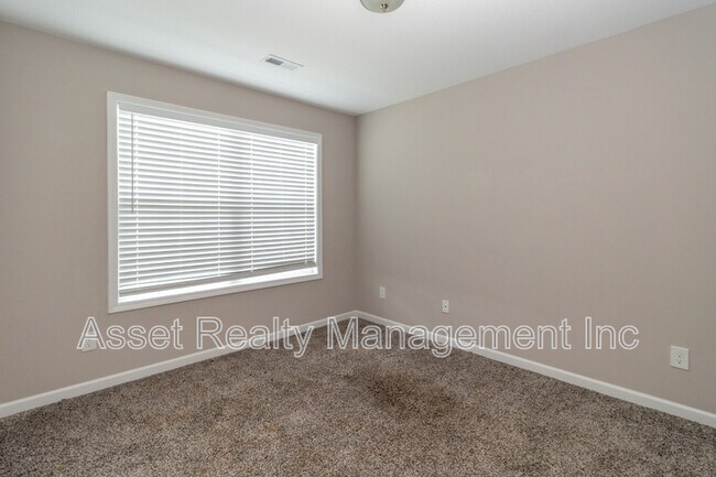 Building Photo - 8205 Zodiac Ln