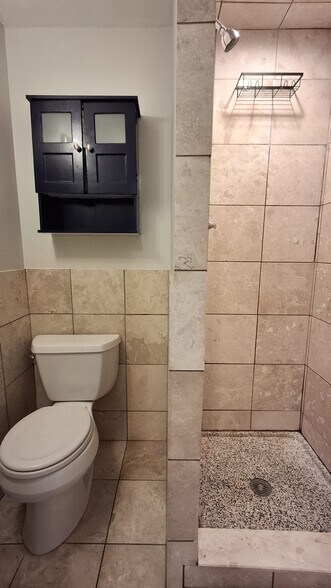 Full bathroom with stall shower - 404 Madison St