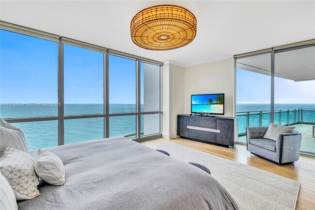 Building Photo - 10295 Collins Ave