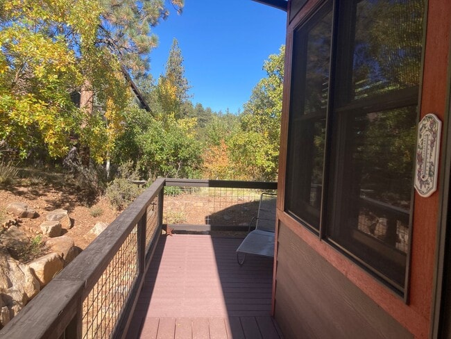 Building Photo - Charming 2-Bedroom, 2-Bath Cabin Retreat
