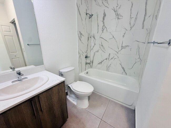 Building Photo - 1295 W 69th St
