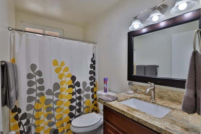 Building Photo - Coming in June......Sunny & Spacious 3BR Condo – Minutes from the Beach