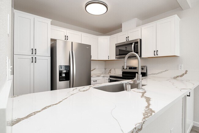 Primary Photo - Newly remodeled upstairs condo in gated co...