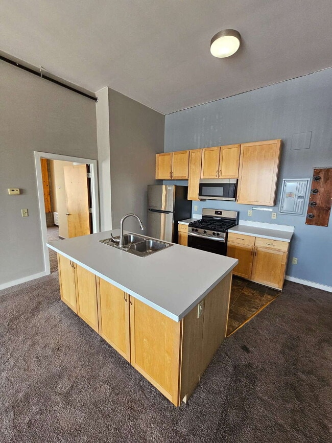 Building Photo - Unique 2 Bedroom Downtown Mount Clemens Loft with Updated Kitchen, Spacious Living Room, Balcony ...
