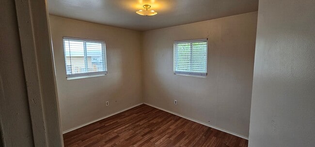 Building Photo - Live Large in a Cozy Retreat! Private Back...