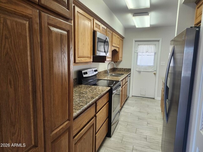 Building Photo - 3136 W Port Au Prince Ln