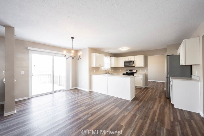 Building Photo - "Spacious 4-Bedroom Gem with Finished Base...