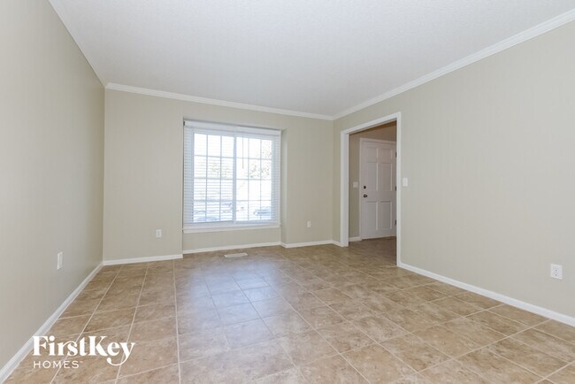 Building Photo - 1613 E Frontier Ln