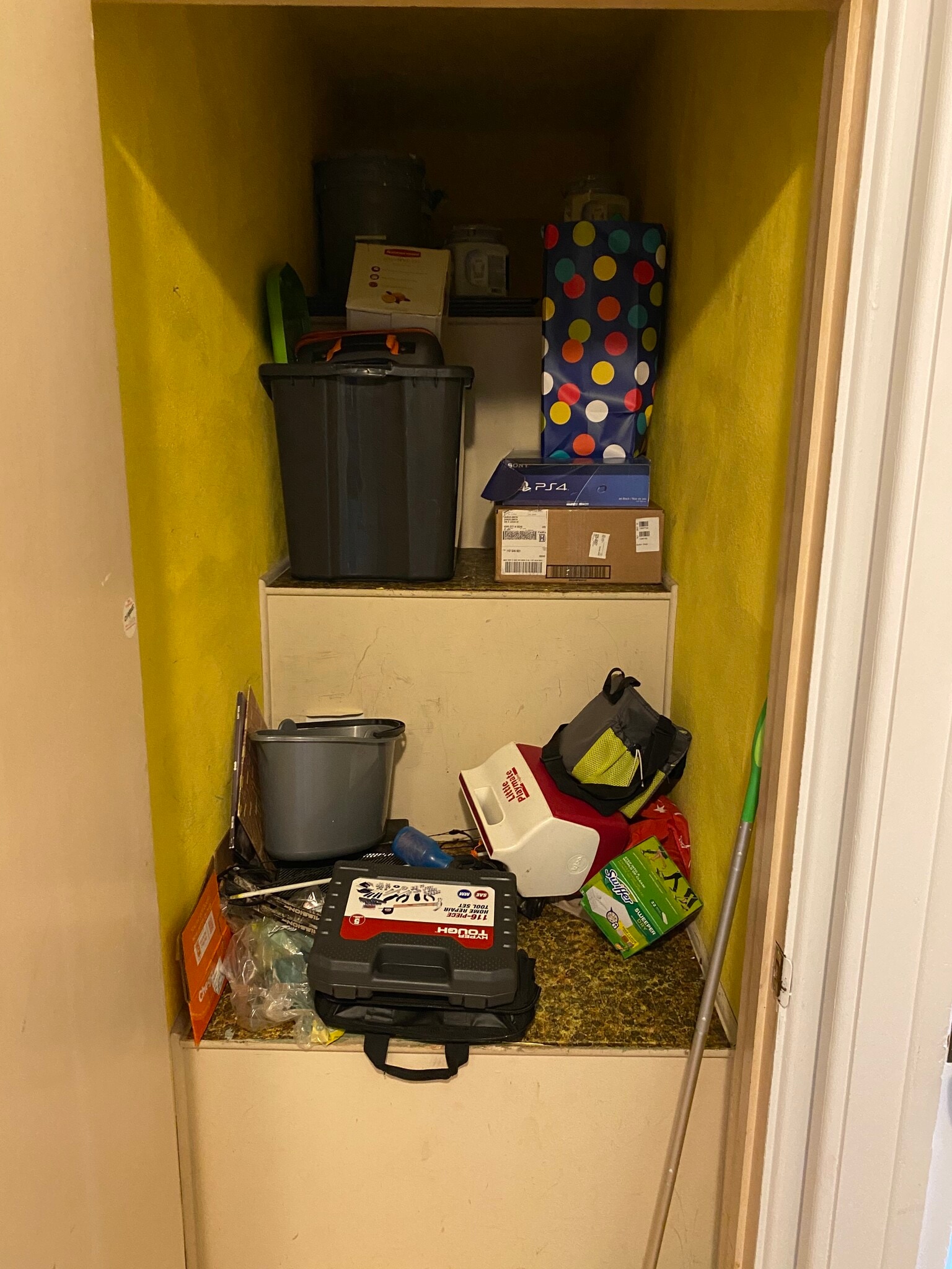 storage above stairs - 609 S Lucas St