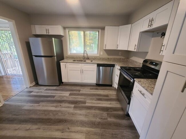 Building Photo - COMING SOON: Beautiful 4BR 2.5BA Home w/ Renovated Kitchen • Granite & Stainless • Garage Parking...