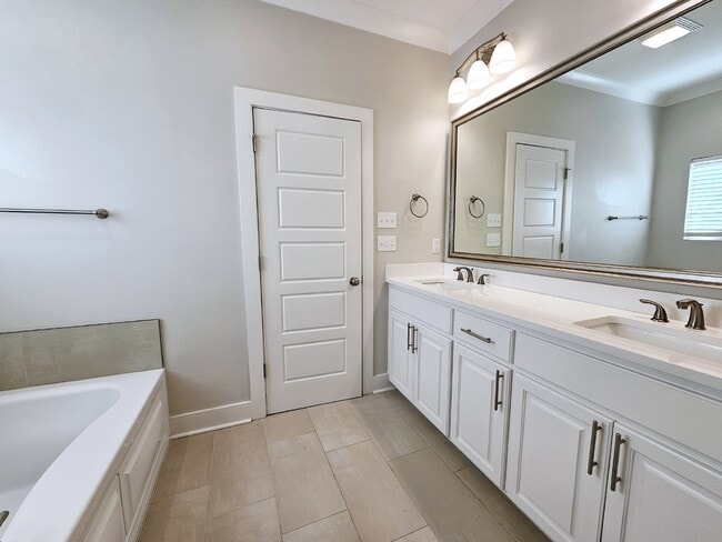 Building Photo - Stunning 4-Bedroom Waterfront Home with Granite Countertops and Hardwood Floors in The Sanctuary ...