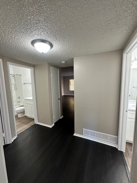 View from hallway from second bedroom - 7385 Lariat Pl