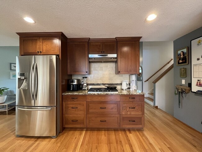 Building Photo - Bright and Open 4 Bedroom Cedar Mill Home with Vaulted Ceilings, Skylights & Multiple Living Areas