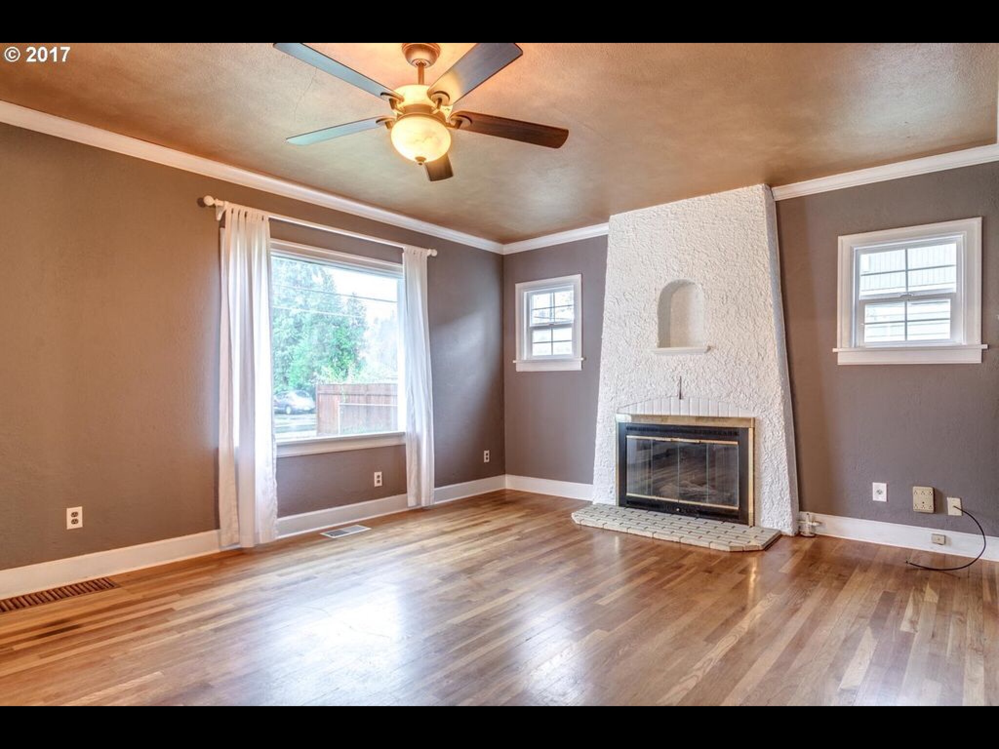 Living Room with Fireplace - 4709 NE 15th Ave