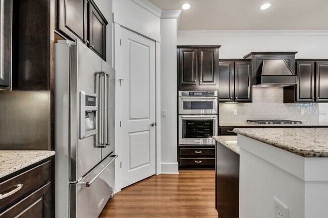 Building Photo - Beautifully maintained and move-in ready, this stunning mostly one-level all-brick home