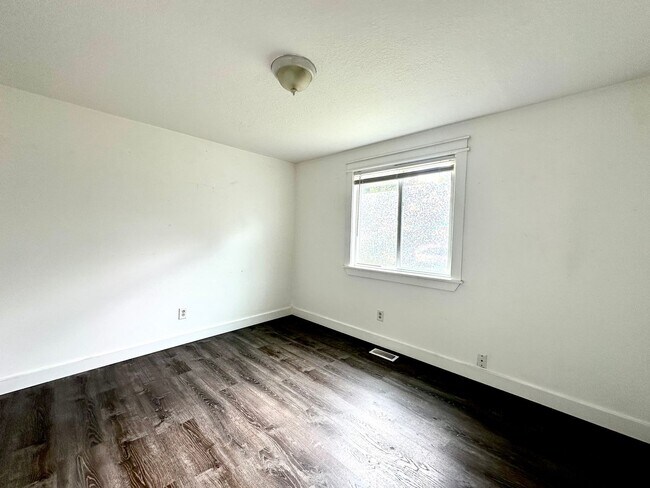 Building Photo - Three bedroom home with large fenced yard