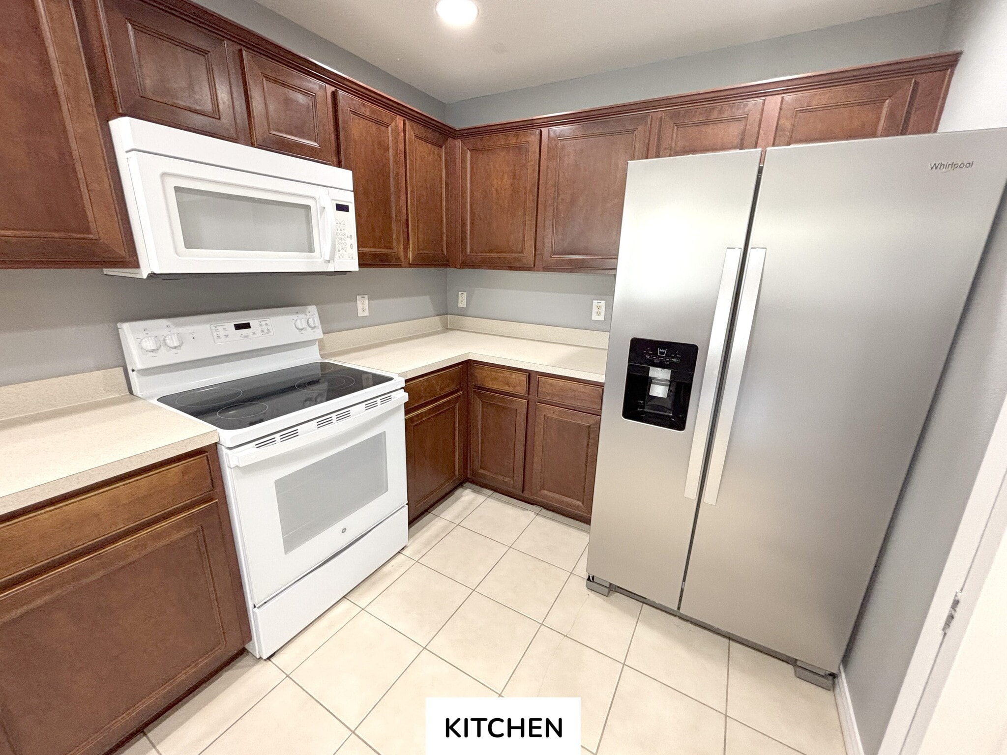 Kitchen new refrigerator and dishwasher - 4045 Pemberly Pines Cir