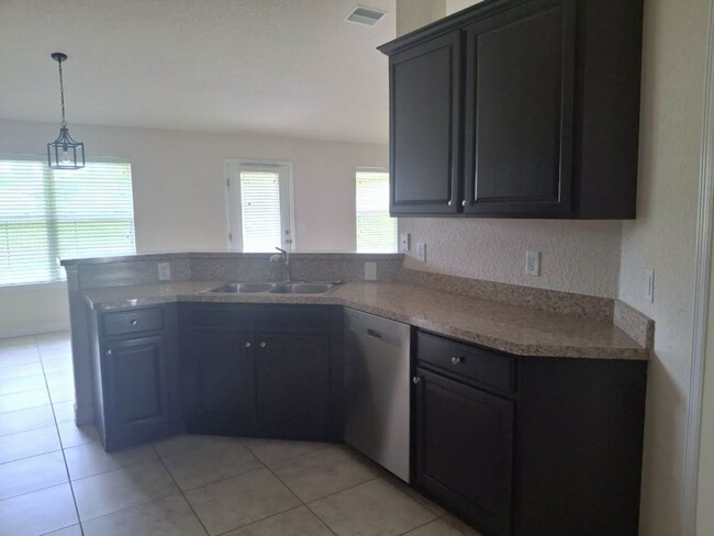 Building Photo - Spacious 4-Bedroom Brick Home in Preserve ...