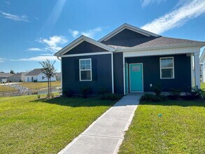 Building Photo - Brand new home with community amenties nes...