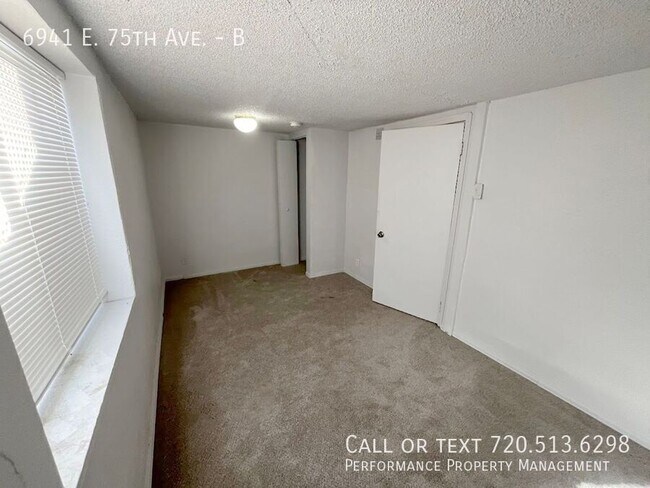 Building Photo - 6941 E 75th Ave