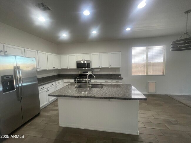 Building Photo - 13159 W Rowel Rd