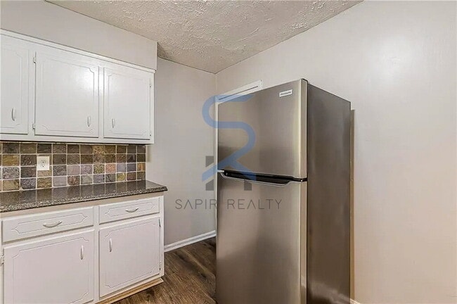 Building Photo - LIMITED-TIME OFFER!  Apply today with NO APPLICATION FEE! Terms apply. Call (678) 487-7896, Optio...