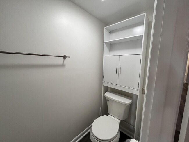 Building Photo - Two-story condominium, featuring 2 bedrooms and 2 1/2 bathrooms