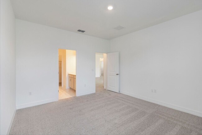 Building Photo - Beautiful Brand New Energy Efficient 4/2 C...