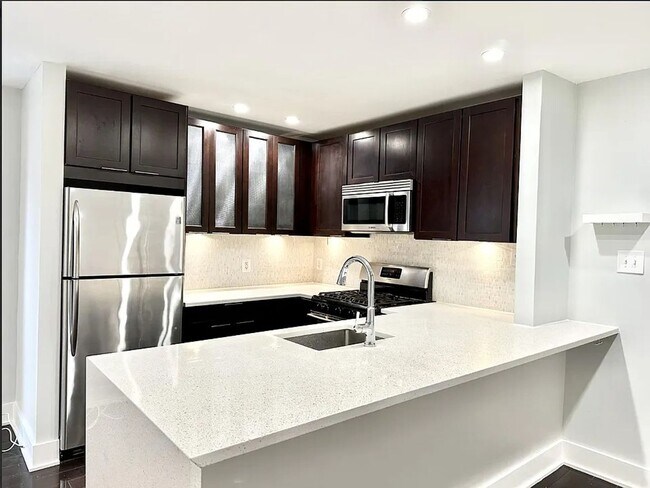 Building Photo - Sleek One-Bedroom in Eastern Market - Parking Spot Included!