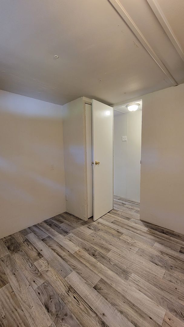 Building Photo - 2 Bed | 1 1/2 Bath | Fenced & Gated 1/4 Acre of land