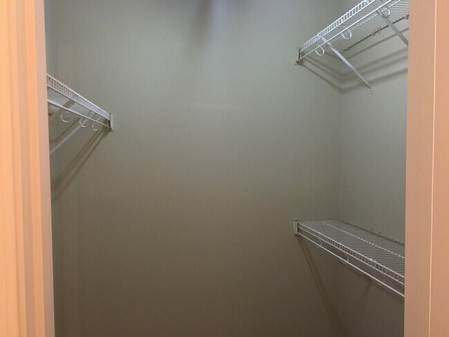 Building Photo - Gas Fireplace! Fenced-in Patio! Storage Space!