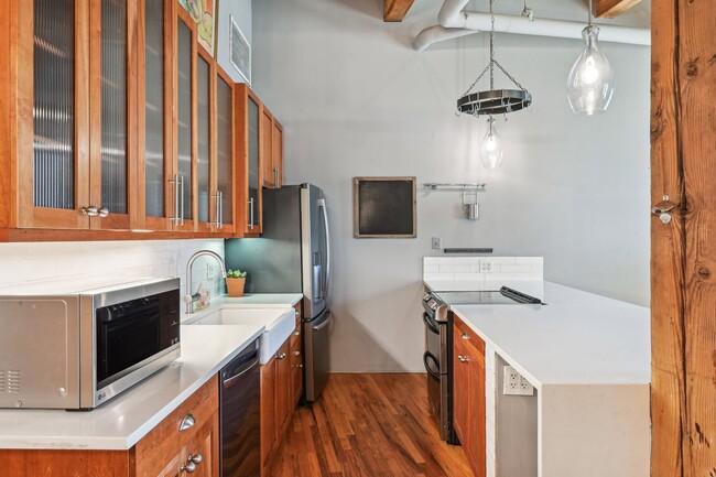 Building Photo - Open floor living at its best! 1 BR/2 BA l...