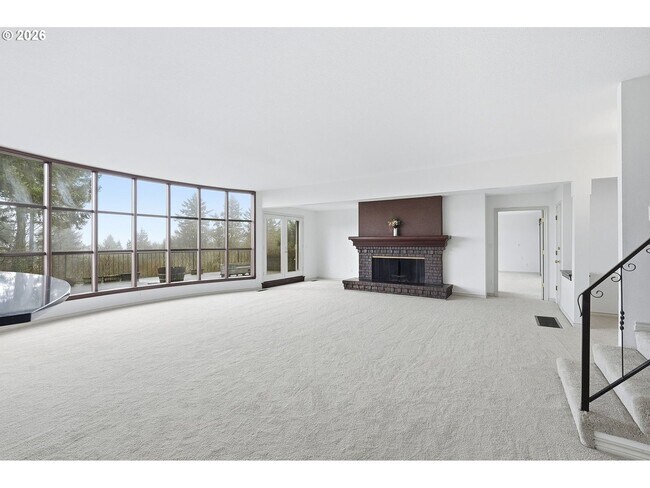 Building Photo - One-of-a-Kind 5BR Home with Floor-to-Ceiling Windows, Wraparound Decks & Breathtaking Treeline Views