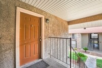 Building Photo - Bright & Charming Condo with Hardwood Floors and Included Appliances!
