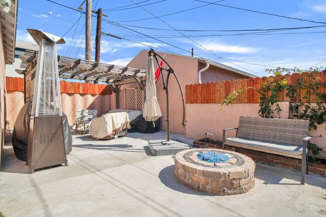 Building Photo - Stunning Remodeled Corner-Lot Home – An En...