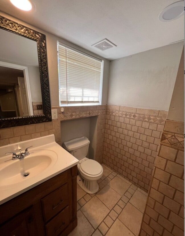 Building Photo - Spacious 4-Bedroom Home with Finished Base...