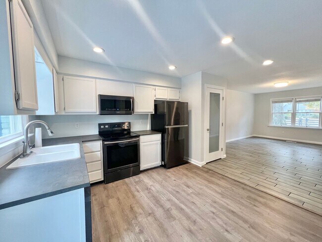 Building Photo - Newly Remodeled 2BD, 1.5BA Raleigh Townhome with a Fenced Backyard in a Prime Location