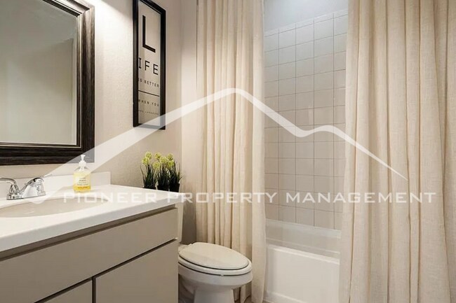 Building Photo - Stylish Main-Level Living with Finished Ba...