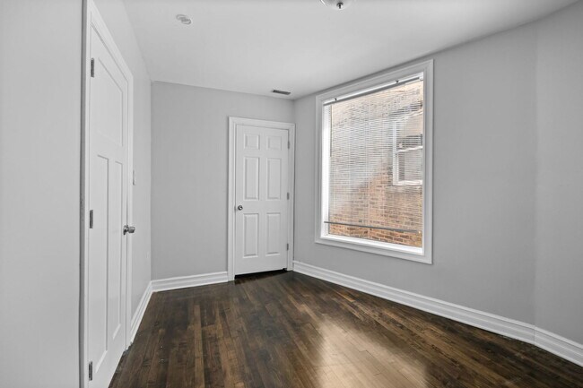 Building Photo - 1651 S Drake Ave