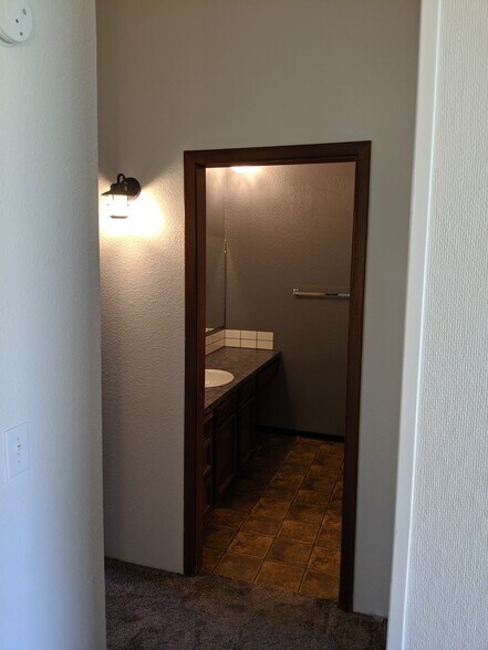 Looking into the sink area from the landing. - 2115 Pleasanton St