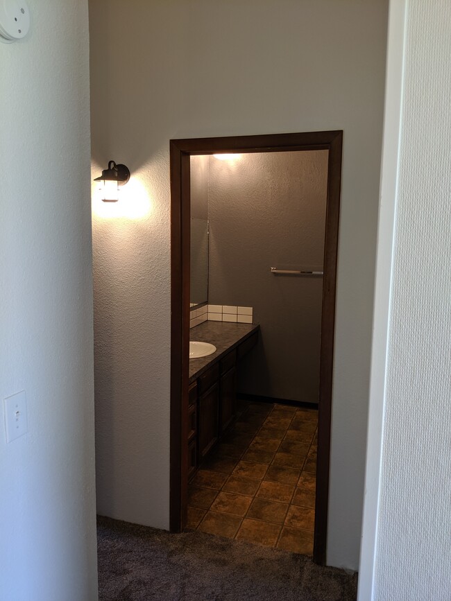 Looking into the sink area from the landing. - 2115 Pleasanton St